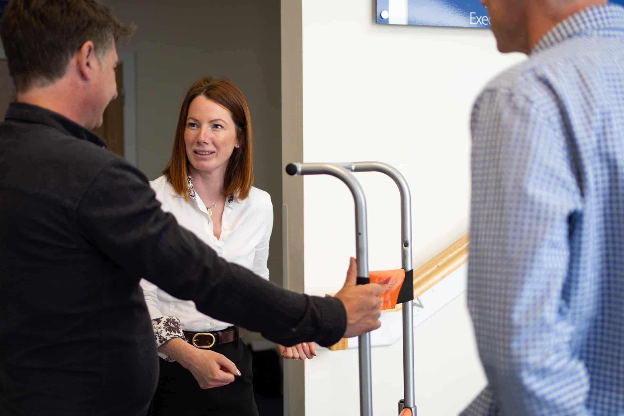 Emma and Chris from The Evacuation Company conducting evacuation equipment training with a client.